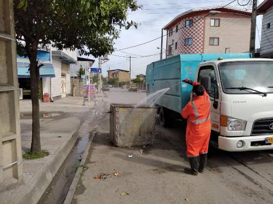 شستشو مخازن زباله و گاری دستی در سطح شهر و ضدعفونی انبار خدمات شهری